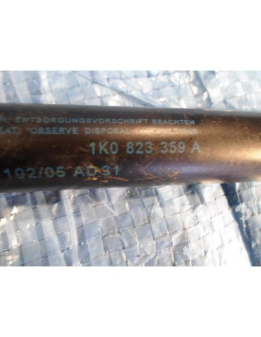 VW GOLF V SIŁOWNIK TELESKOP MASKI 1K0823359A